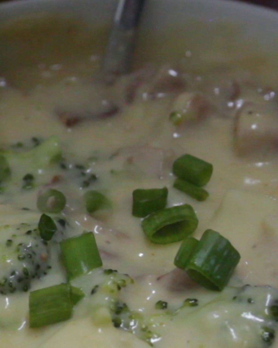 Finished loaded potato soup topped with green onion